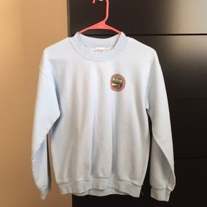 light blue sweatshirt
